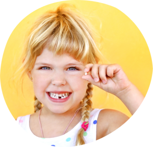 young girl who lost a baby tooth