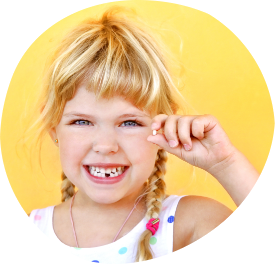 young girl who lost a baby tooth