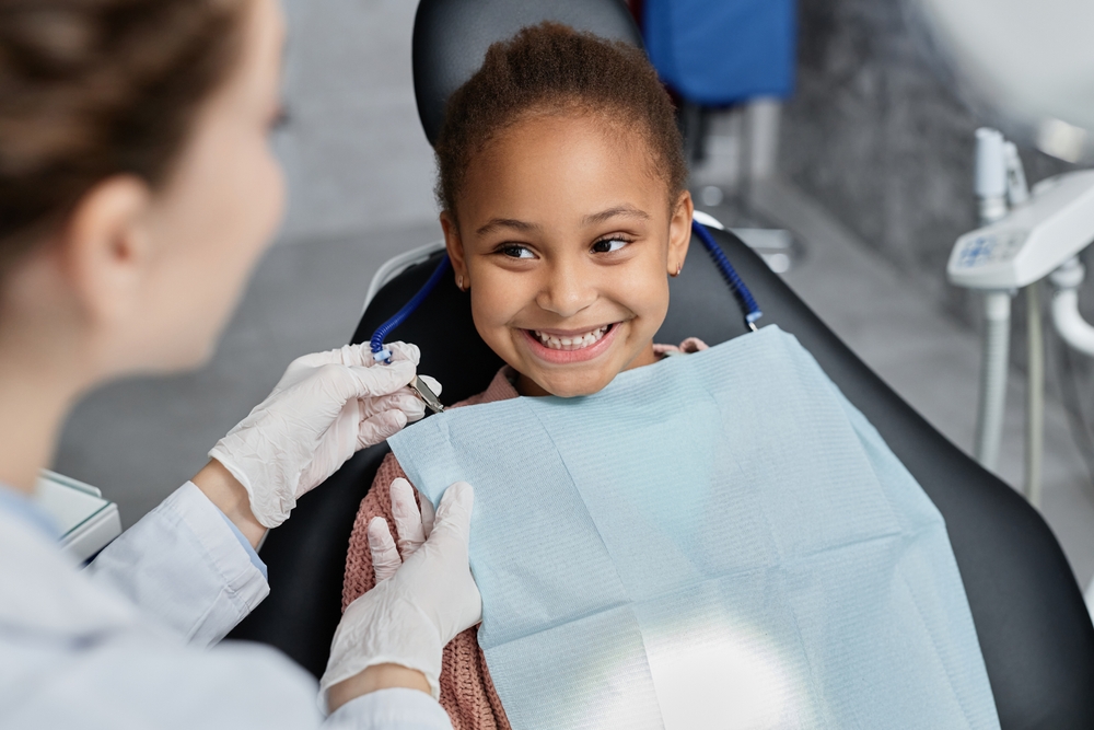 young girl getting a dental checkup