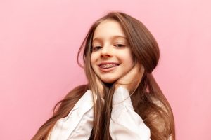 young girl wearing braces