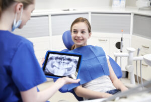 girl at dentist getting x-ray