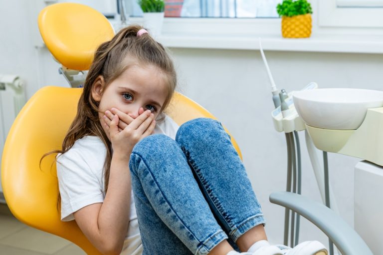 frightened child at dentist